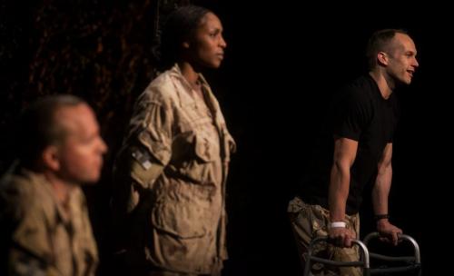 The Tarragon Theatre and Prairie Theatre Exchange joint production of This Is War. John Cleland as Sergeant Hughes (foreground) Lisa Berry as Master Corporal Tanya Young and Ian Lake as Private Jonny Henderson.  (Melissa Tait / Winnipeg Free Press)