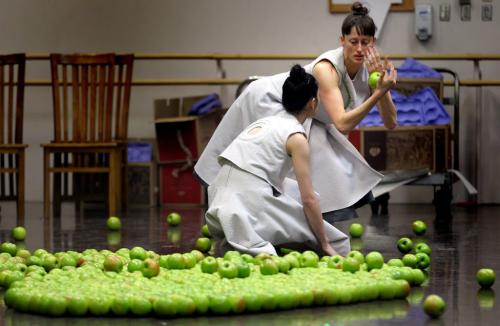 Winnipeg Contemporary Dancer Johanna Riley (top and right) and Royal Winnipeg Ballet's Sophia Lee perform Choreographer Peter Quantz's "Q Dance" in rehearsal Wednesday afternoon. The dance takes place on a stage strewn with Granny Smith Apples. See Holly Harris story. - February 20, 2013 - (Phil Hossack / Winnipeg Free Press)