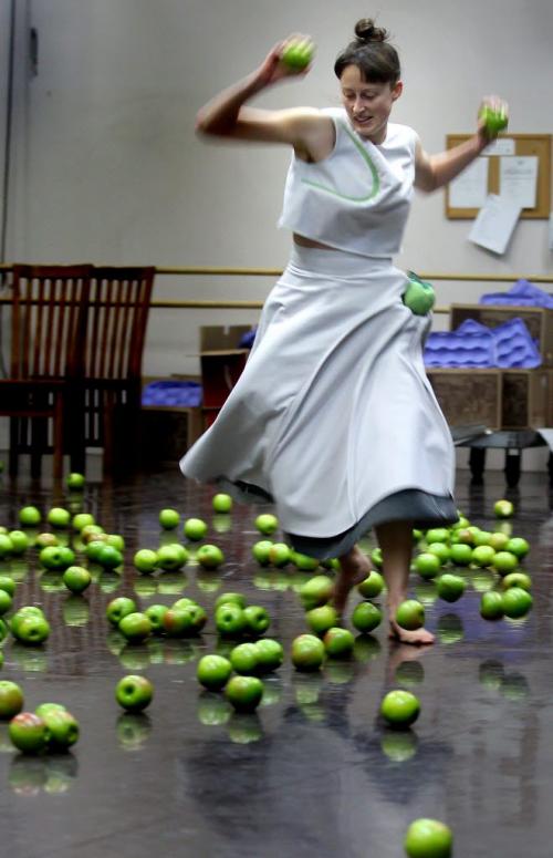 Winnipeg Contemporary Dancer Johanna Riley performs Choreographer Peter Quantz's "Q Dance" in rehearsal Wednesday afternoon. The dance takes place on a stage strewn with Granny Smith Apples. See Holly Harris story. - February 20, 2013 - (Phil Hossack / Winnipeg Free Press)