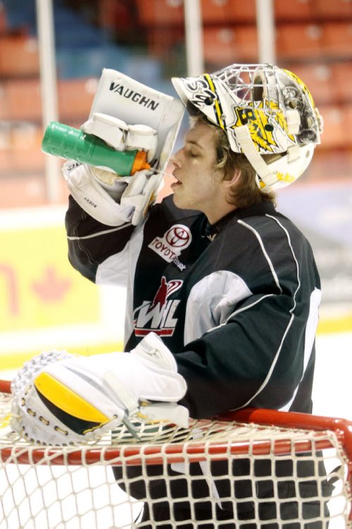 Brandon Sun 20022013 Goalie Corbin Boes takes a drink of water during Wheaties practice at Westman Place on Wednesday. (Tim Smith/Brandon Sun)