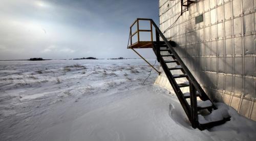 Stairway to Heaven....Stairs along the side of old grain elevator standing sentilel alongside an abandoned railway line in Clanwilliam peer over the prairie landscape Thursday afternoon. WEATHER STAND-UP? February 21, 2013 - (Phil Hossack / Winnipeg Free Press)