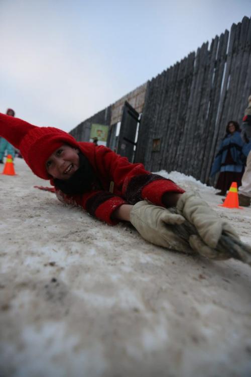 Cabrel St. Vincent, 8, a member of the official Voyageur family, loses a tug-o-war, at the Festival du Voyageur, Saturday, February 23, 2013. (TREVOR HAGAN/WINNIPEG FREE PRESS)