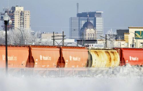 A typical Winnipeg winter scene including frost covered trees, a CN train and the Legislative Building as seen from near the Jubilee Overpass, Sunday, February 24, 2013. (TREVOR HAGAN/ WINNIPEG FREE PRESS)