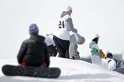 Frankie Triolla, 9, looks over at the Snow Jam Snowboarding Competition at The Forks, Sunday, February 24, 2013. (TREVOR HAGAN/WINNIPEG FREE PRESS)