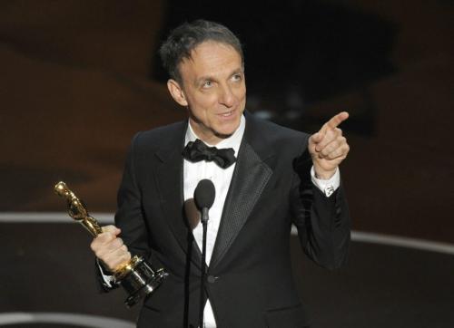 Mychael Danna accepts the award for best original score for "Life of Pi" during the Oscars at the Dolby Theatre on Sunday Feb. 24, 2013, in Los Angeles.  (Photo by Chris Pizzello/Invision/AP)