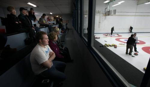Spectators line risers at the Carberry Curling Club's annual community bonspiel. Featuring over a hundred teams, the spiel is a success story in the rural curling world. Feb 21, 2013 - (Phil Hossack / Winnipeg Free Press)