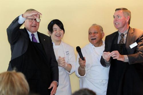 Dr. Lloyd Axworthy, president and vice-chancellor at UWinnipeg,  and Winnipeg Technical College president John Bobbette make some chinese dumplings at a news conference. The program, named Restaurant and Food Services Entrepreneurship Diploma, was announced today at the Assiniboine Park Conservatory. It combines Winnipeg Technical Colleges Culinary Arts & Design Program and the Business and Economics Bachelor of Business Administration program at The University of Winnipeg. Student chef Yin Niu and instructor Louis Rodriguez in middle. Feb 26, 2013  BORIS MINKEVICH / WINNIPEG FREE PRESS