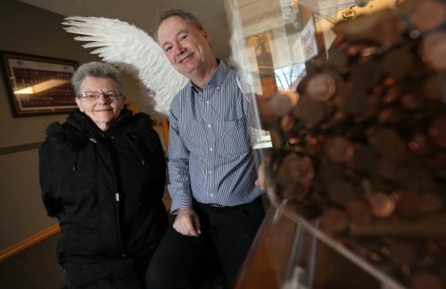Olive Fontain stopped at Desjardins Funeral Home to visit Kevin Rollason and drop off pennies for the Pennies from Heaven campain, Wednesday, February 27, 2013. (TREVOR HAGAN/WINNIPEG FREE PRESS)