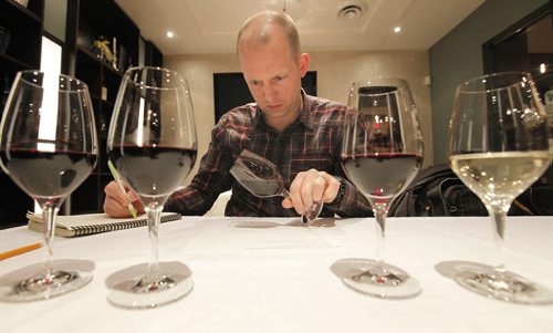 February 27, 2013 - 130227  -  Ben MacPhee-Sigurdson competes in the first annual Manitoba Wine Tasting Championships at The Winehouse Wednesday February 27, 2013.  John Woods / Winnipeg Free Press