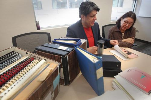 Darrell Chippeway  and Kathy Mallett look over treasures they have located while researching the urban aboriginal history projectSee Carol Sanders story- February 28, 2013   (JOE BRYKSA / WINNIPEG FREE PRESS)