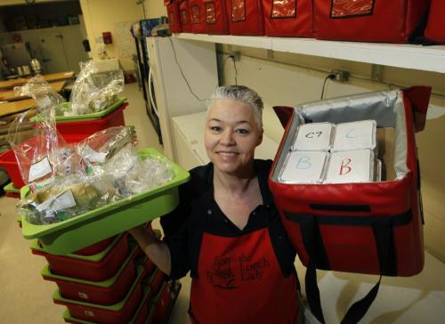 Detour feature on businesses with names that sound like superheroes... Christine Fisher is the Lunch Lady with lunches for school students.  ( Dave Sanderson story (WAYNE GLOWACKI/ WINNIPEG FREE PRESS) WINNIPEG FREE PRESS  March 1 2013
