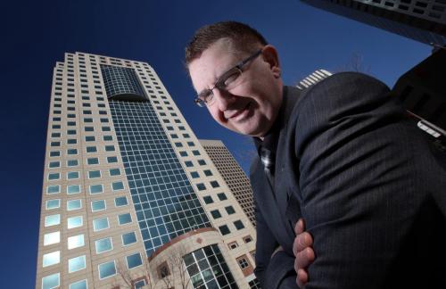 Creswin's Senior Property Manager Terry Orsulak poses in front of the Former TD Bank / CanWest Global building at Portage and main street. Creswin will announce a new name in March...See Murray McNeil's story. March 1, 2013 - (Phil Hossack / Winnipeg Free Press)