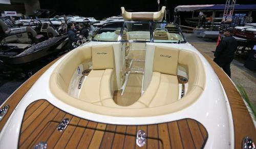 An expensive Chris Craft boat was quite popular at the 2013 Mid Canada Boat Show at the Winnipeg Convention Centre, Friday, March 1, 2013. (TREVOR HAGAN/WINNIPEG FREE PRESS)