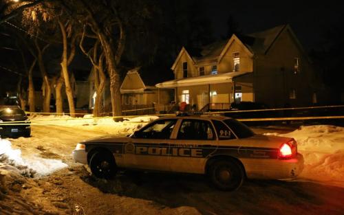 Winnipeg Police on the scene after a man and woman were both taken to hospital, Friday, March 1, 2013. (TREVOR HAGAN/ WINNIPEG FREE PRESS)