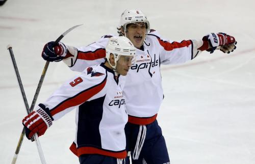 Washington Capitals' Mike Ribeiro (9) and Alex Ovechkin (8) celebrate after the pair combined for a Ribeiro goal during the third period of NHL hockey action against the Winnipeg Jets' at MTS Centre, Saturday, March 2, 2013. (TREVOR HAGAN/WINNIPEG FREE PRESS)