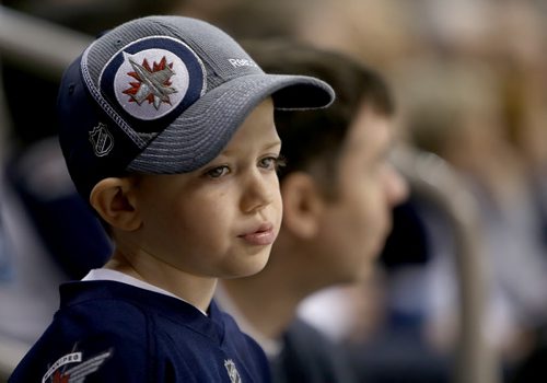 This young fan didn't have much to smile about. He was watching as the Winnipeg Jets' faced the Washington Capitals' during NHL hockey action at MTS Centre, Saturday, March 2, 2013. (TREVOR HAGAN/WINNIPEG FREE PRESS)