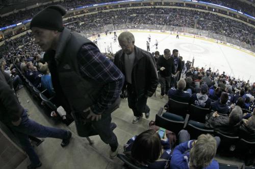 Fans beat the traffic during the third period of a 3-0 Jets loss to the Washington Captitals during NHL hockey action at MTS Centre, Saturday, March 2, 2013. (TREVOR HAGAN/WINNIPEG FREE PRESS)