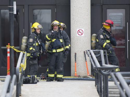 030213 Winnipeg-   Firefighter are on the scene of a working fire at the Winnipeg Tax Centre on Stapon Road Saturday morning. Sixty-five employees were evacuated to Kildonan Place Mall. DAVID LIPNOWSKI / WINNIPEG FREE PRESS