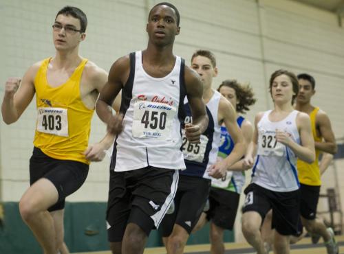 030213 Winnipeg-  Egide Ndayinukiye (second from left) leads the pack in the 800M youth race during the 32nd Annual Boeing Indoor Classic Tracking and Field Meet at the Max Bell Centre at The University of Manitoba Saturday. DAVID LIPNOWSKI / WINNIPEG FREE PRESS