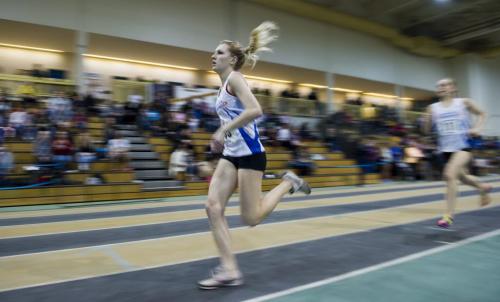 030213 Winnipeg-  Sarah Slusar leads the 800M women's youth event and won her heat during the 32nd Annual Boeing Indoor Classic Tracking and Field Meet at the Max Bell Centre at The University of Manitoba Saturday. DAVID LIPNOWSKI / WINNIPEG FREE PRESS