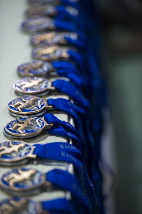 030213 Winnipeg-  Medals lie on a table during the 32nd Annual Boeing Indoor Classic Tracking and Field Meet at the Max Bell Centre at The University of Manitoba Saturday. DAVID LIPNOWSKI / WINNIPEG FREE PRESS