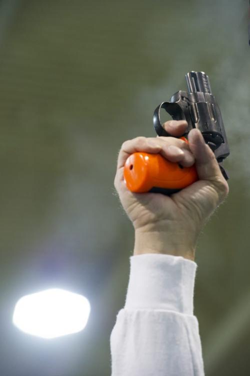 030213 Winnipeg-  The starters pistol during the 32nd Annual Boeing Indoor Classic Tracking and Field Meet at the Max Bell Centre at The University of Manitoba Saturday. DAVID LIPNOWSKI / WINNIPEG FREE PRESS