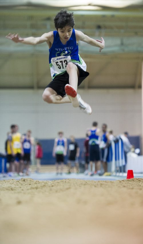 030213 Winnipeg-  Connor Hadaller competes in the long jump during the 32nd Annual Boeing Indoor Classic Tracking and Field Meet at the Max Bell Centre at The University of Manitoba Saturday. DAVID LIPNOWSKI / WINNIPEG FREE PRESS