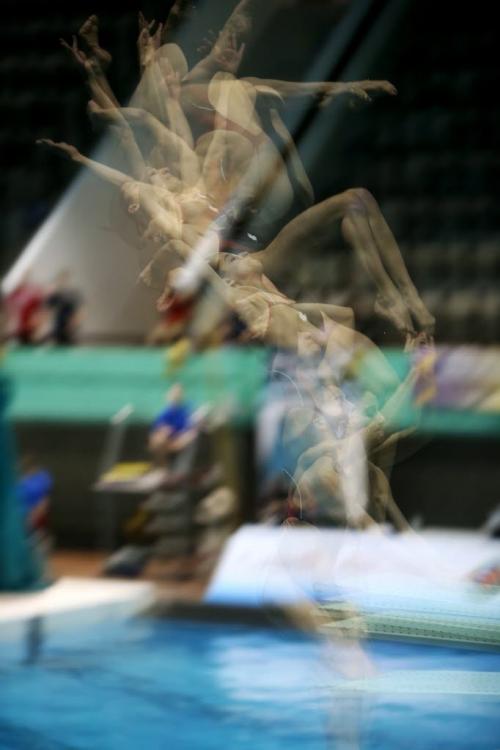Eloise Belanger, from Montreal, QC, competes in the Womens Open 3M Diving Finals of the 2013 Winter Senior Nationals at Pan Am Pool, Sunday, March 3, 2013. (TREVOR HAGAN/WINNIPEG FREE PRESS) - multiple exposure