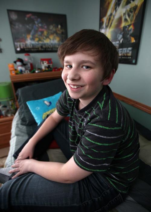 Colin Johnson poses at home in his bedrom. The 14 yr old has struggled with arthritis since his early years. See Steph Crosier's story re; Arthritis. March4, 2013 - (Phil Hossack / Winnipeg Free Press)