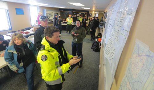 Brandon Sun  (Bruce Bumstead/Brandon Sun)Volunteers with SARMAN (Search and Rescue Mantioba), including members of the Brandon Regional Search and Rescue, the Civic Air Search and Rescue Association and the Office of the Fire Commissioner, record the details for a joint ground search and rescue exersice at the Brandon Flying Club on Sunday morning. Due to bad weather, members of CASARA worked on the ground to locate an emergency locator transmitter at a mock airplane crash site located northeast of Forrest, Man. Once the members of CASARA pin-pointed the downed plan, ground searchers were call in to find the surviors, played by volunteer members of SARMAN, including the use of K-9 handlers.