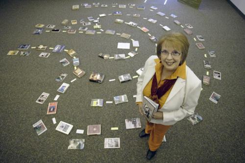 John Woods / Winnipeg Free Press / April 14/07- 070414  - Author Marjorie Anderson stands beside a labyrinth of books at The Manitoba Labyrinth Network meeting at the Pembina Trail Library  Saturday, April 14/07.