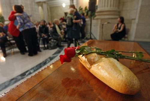 STDUP - Bread and Roses  stood as symbols at the head talbe - 300 people took part in Manitoba Legislative Building , Rotunda  Celebration of International Women's Day (11:45 am ), sandwich luncheon  was served and speakers marked the annual event ,  that started at the United Nations 1975 KEN GIGLIOTTI / Mar. 8 2013 / WINNIPEG FREE PRESS
