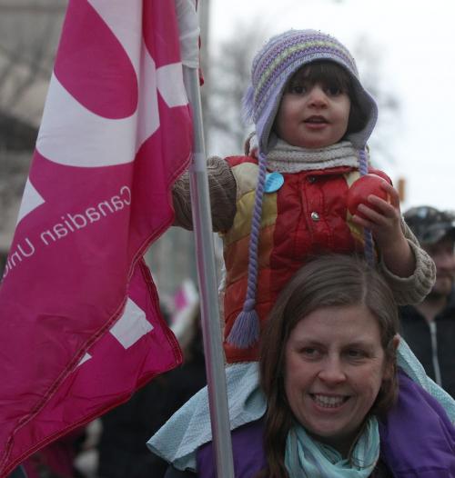 Samira Carlyle-Hozaima and her mom  Liz Carlyle at Womens Day march in downtown Winnipeg Friday nightSee Randy Turner story- March 08, 2013   (JOE BRYKSA / WINNIPEG FREE PRESS)