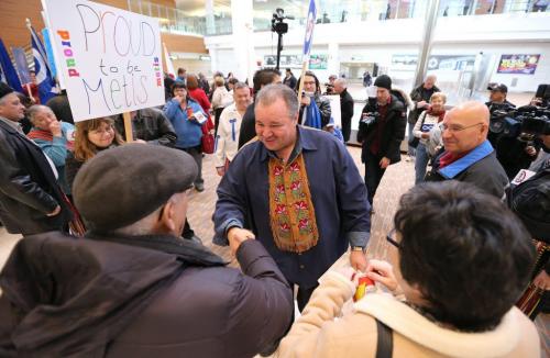 Manitoba Metis Federation president David Chartrand was welcomed home to Winnipeg Richardson Airport on Sat., March 9, 2013, by over 100 people. On March 8, 2013, the Supreme Court ruled the federal government was "ineffectual and inequitable" in how it handed out land to M¾©tis children in Manitoba more than 130 years ago. Photo by Jason Halstead/Winnipeg Free Press