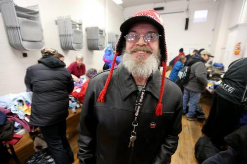 Tim Curry, at Lighthouse Mission, as they distribute warm clothes and shoes to hundreds of Winnipeggers courtesy of Project Echo, Saturday, March 9, 2013. (TREVOR HAGAN/WINNIPEG FREE PRESS)