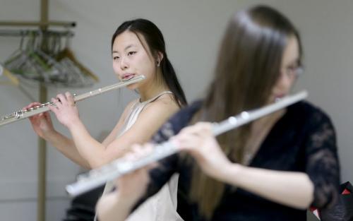 Jaena Kim and Katy Thurmeier prepare to perform while backstage at the Aikins Memorial Trophy Competition at the Winnipeg Art Gallery, Saturday, March 9, 2013. (TREVOR HAGAN/WINNIPEG FREE PRESS) - for tuesday music page