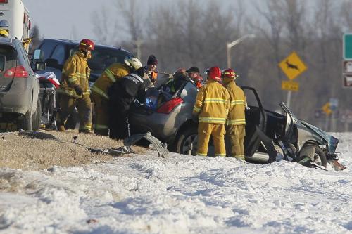 March 12, 2013 - 130312  -  Emergency crews and STARS extricate the victim of a car/semi mvc just north of St Malo on highway 59 Tuesday, March 12, 2013. John Woods / Winnipeg Free Press