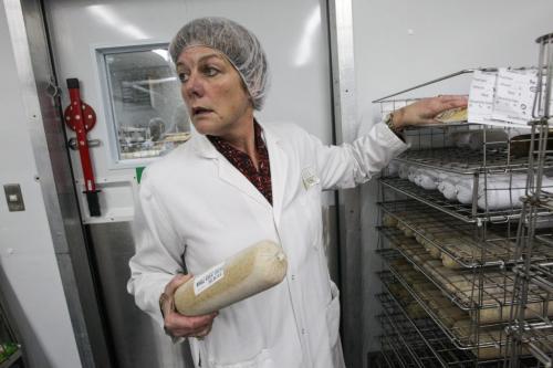 Kathleen Richardson Chief Nutrition and Food Services Officer holding a bag of frozen pureed whole wheat bread during a tour of the Regional Distribution Facility at the WRHA Nutrition and Food Services Centre at 345 De Baets Street in St. Boniface.  130312 - Tuesday, March 12, 2013 -  (MIKE DEAL / WINNIPEG FREE PRESS)