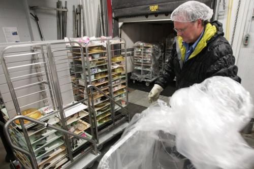 Richard Degagne unloads a rack full of used trays is returned to the facility for sanitation during a tour of the Regional Distribution Facility at the WRHA Nutrition and Food Services Centre at 345 De Baets Street in St. Boniface.  130312 - Tuesday, March 12, 2013 -  (MIKE DEAL / WINNIPEG FREE PRESS)