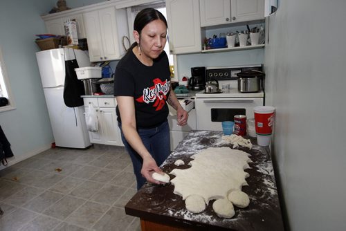 Althea Guiboche  makes Bannock in her home  and hands it to  people on the street Äì geoff kirbyson story  KEN GIGLIOTTI / Mar. 12 2013 / WINNIPEG FREE PRESS