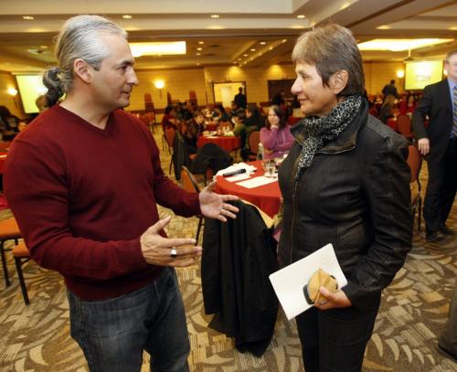 Sagkeeng Chief Donavan Fontaine talks with   with Cree physician Marlyn Cook  at the two day Prescription drug abuse conference his held to deal with the  abuse of RX drugs by First Nation on reserves , sponsored by Sagkeeng First Nation held at Club Regent Äì alex paul  KEN GIGLIOTTI / Mar. 12 2013 / WINNIPEG FREE PRESS