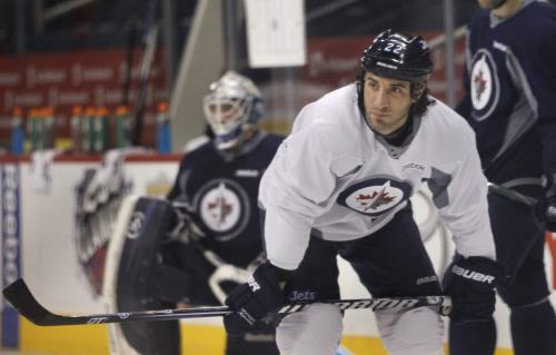 Winnipeg Jets forward Chris Thorburn skating with a small group of team mates in the MTS Centre Friday morning. Ed Tait  story(WAYNE GLOWACKI/WINNIPEG FREE PRESS) Winnipeg Free Press March 15 2013