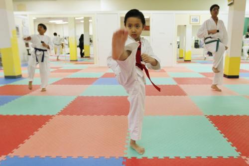 March 15, 2013 - 130315  -  Anthony Contreras practises his Taekwondo at Choi's Taekwondo School Friday, March 15, 2013. Contreras, at 6, is the youngest person to receive the pomm belt (red/black) at Choi's Taekwondo School. John Woods / Winnipeg Free Press