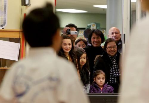 Thirteen family members look on as Anthony Contreras, 6, left, tested for his poom, or junior black belt in taekwondo at Choi's Taekwondo in Garden City Mall, Saturday, March 16, 2013. A very rare feat for someone this young. (TREVOR HAGAN/WINNIPEG FREE PRESS)