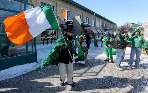 A group gathers and prepares to walk in the St. Patricks Day Parade at The Forks, Saturday, March 16, 2013. (TREVOR HAGAN/WINNIPEG FREE PRESS)