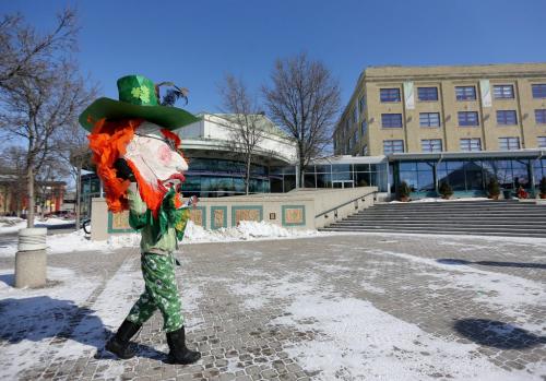 A man wearing a giant Leprechaun head getting ready to walk in the St. Patricks Day Parade at The Forks, Saturday, March 16, 2013. (TREVOR HAGAN/WINNIPEG FREE PRESS)