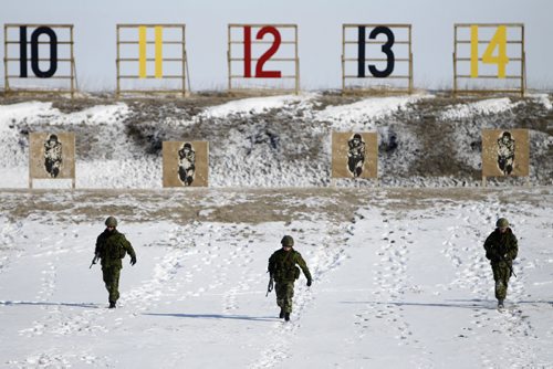 Members of the Lake Superior Scottish Regiment on the range at St. Charles. Members of 16 military teams from the 38 CBG and the US were competing in the T. Eaton Cup Military Skills Competition at the St. Charles Range, in Headingley, Saturday, March 16, 2013. (TREVOR HAGAN/WINNIPEG FREE PRESS)
