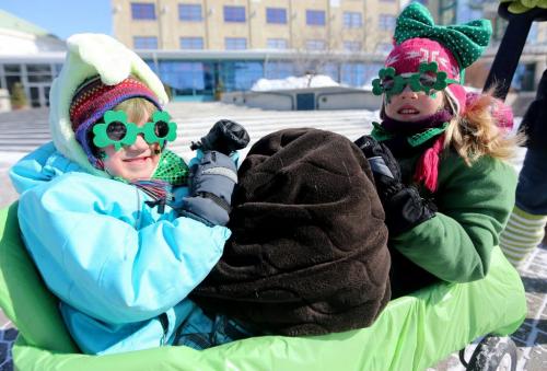 Kamryn McDougall, 4, and Danika McDougall, 7, waiting to depart in the St. Patricks Day Parade at The Forks, Saturday, March 16, 2013. (TREVOR HAGAN/WINNIPEG FREE PRESS)