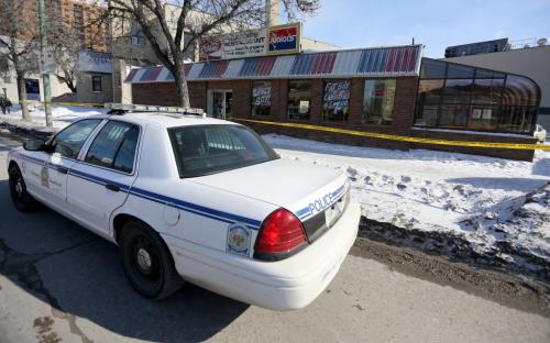 Police investigating a stabbing at Junior's, Saturday, March 16, 2013. (TREVOR HAGAN/WINNIPEG FREE PRESS)