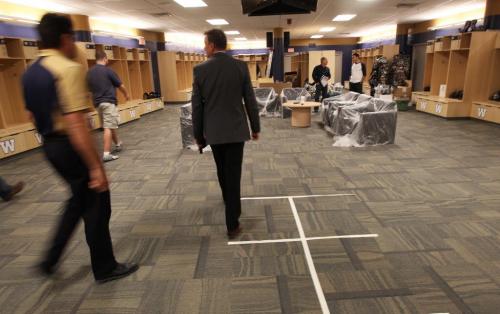 Winnipeg Blue Bombers President Garth Buchko walks in the the new players home dressing room Wednesday. The FreePress was given a tour in Investors Group Field that is under construction- The new stadium will be home to the Winnipeg Blue Bombers for the 2013 season-See Paul Wiecek story- March 08, 2013   (JOE BRYKSA / WINNIPEG FREE PRESS)